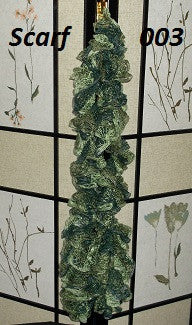 #110  Varied shades of Green with a Silver trim.   Length is 4' 3"