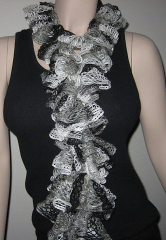 #105 Shades of White, Grey, Black with Silver Trim.  Length is 6' 6"